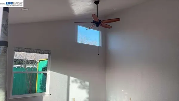 a view of a hallway with a window