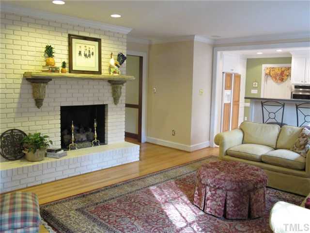507 Spring Valley Drive Raleigh, NC 27609 - Photo 17 of 25 Den also has fireplace with gas logs.