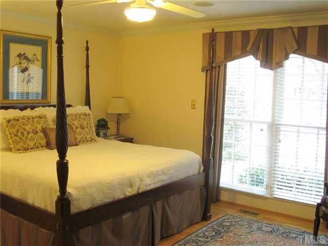 507 Spring Valley Drive Raleigh, NC 27609 - Photo 20 of 25 Huge master bedroom with his and hers closets.