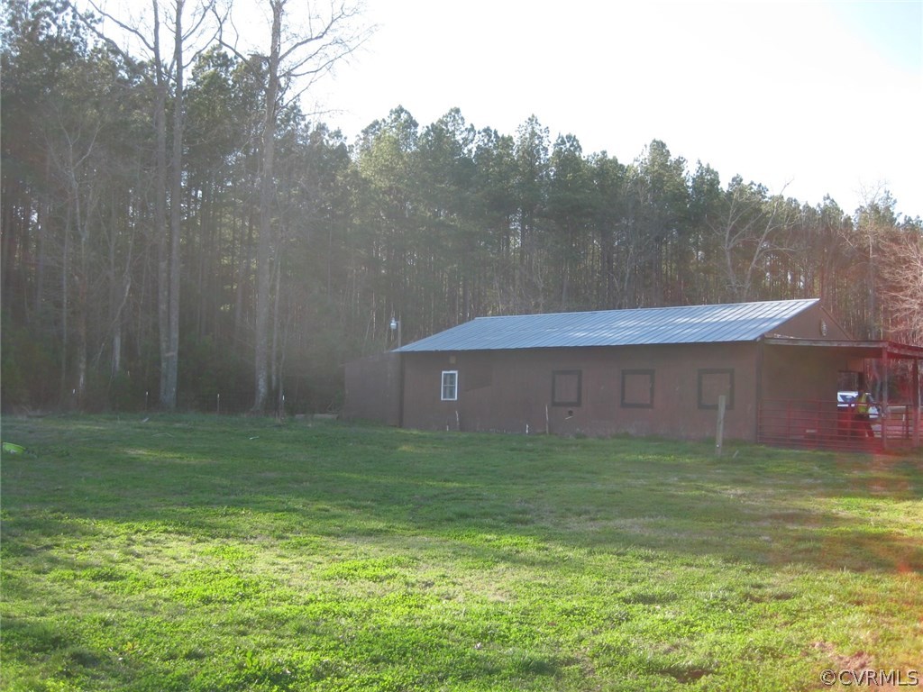 8810 Wells Road Wilsons, VA 23894 - Photo 8 of 31 a view of a back yard