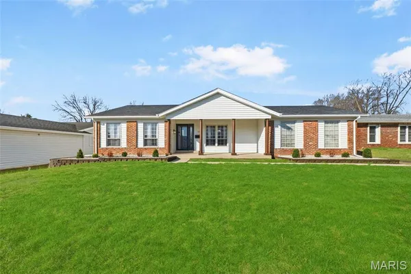 $330,000 | 1323 Woodpath Drive, Florissant, MO 63031