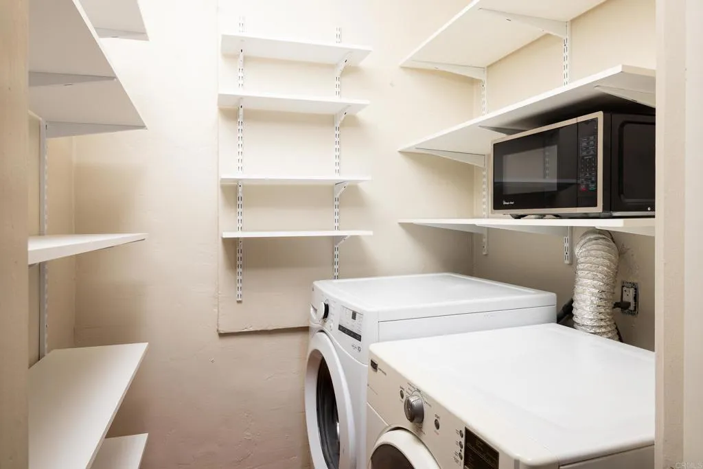 1603 Felton Street San Diego, CA 92102 - Photo 17 of 55 a utility room with dryer and washer