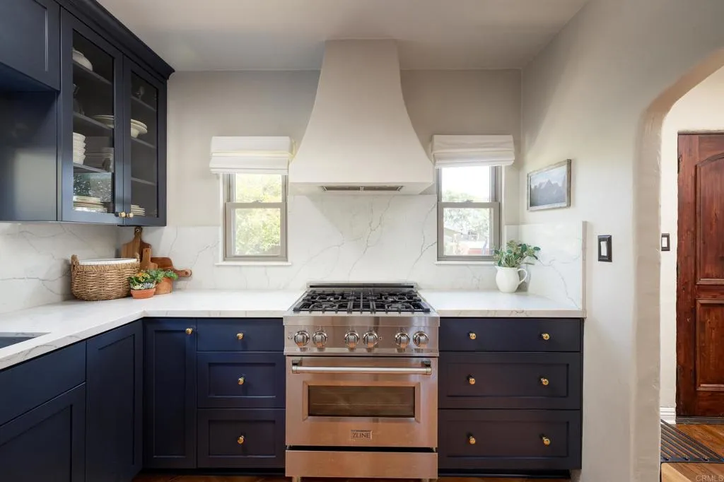 1603 Felton Street San Diego, CA 92102 - Photo 18 of 55 a kitchen with granite countertop a sink cabinets and window