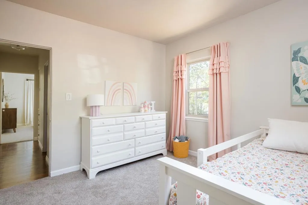 1603 Felton Street San Diego, CA 92102 - Photo 25 of 55 a bedroom with a bed and a dresser