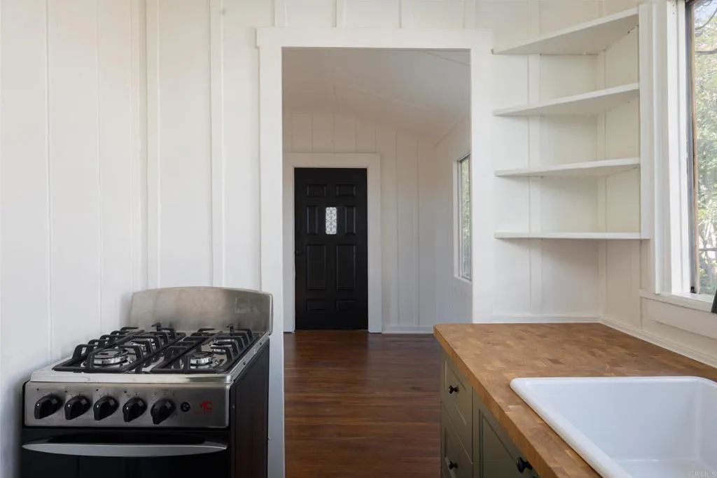 1603 Felton Street San Diego, CA 92102 - Photo 38 of 55 a kitchen with a stove and cabinets