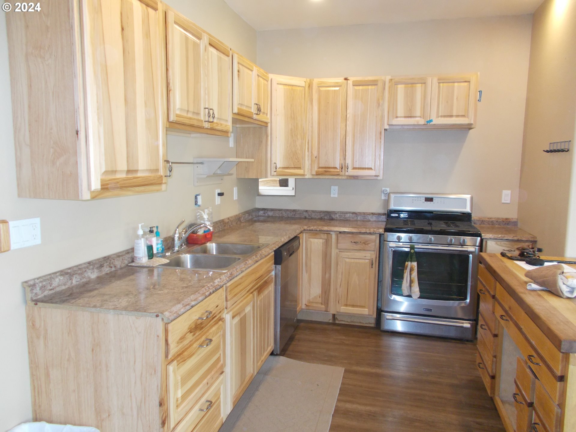 41475 Birch Creek Road Pendleton, OR 97801 - Photo 8 of 21 a kitchen with a sink stove top oven and cabinets