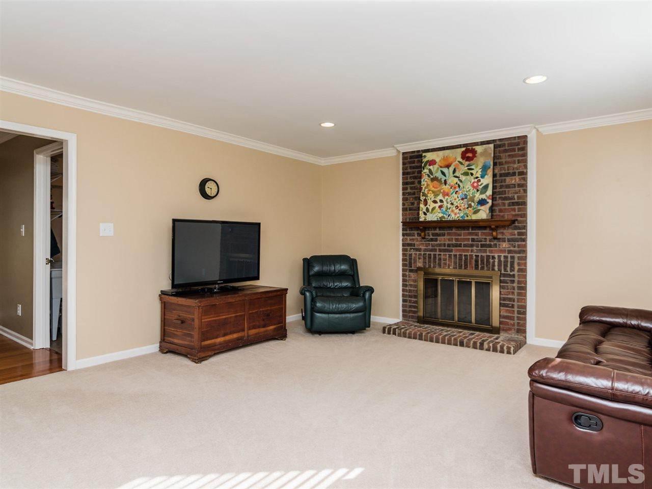 112 Trackers Road Cary, NC 27513 - Photo 12 of 25 Imagine spending time with family and friends in this inviting space.