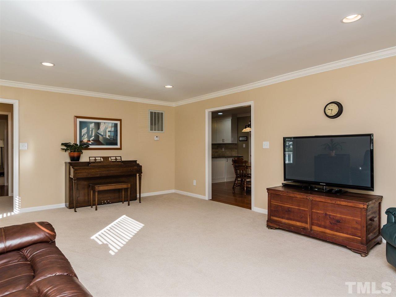 112 Trackers Road Cary, NC 27513 - Photo 13 of 25 Crown molding can be found throughout the first floor of this home which adds a touch of elegance.