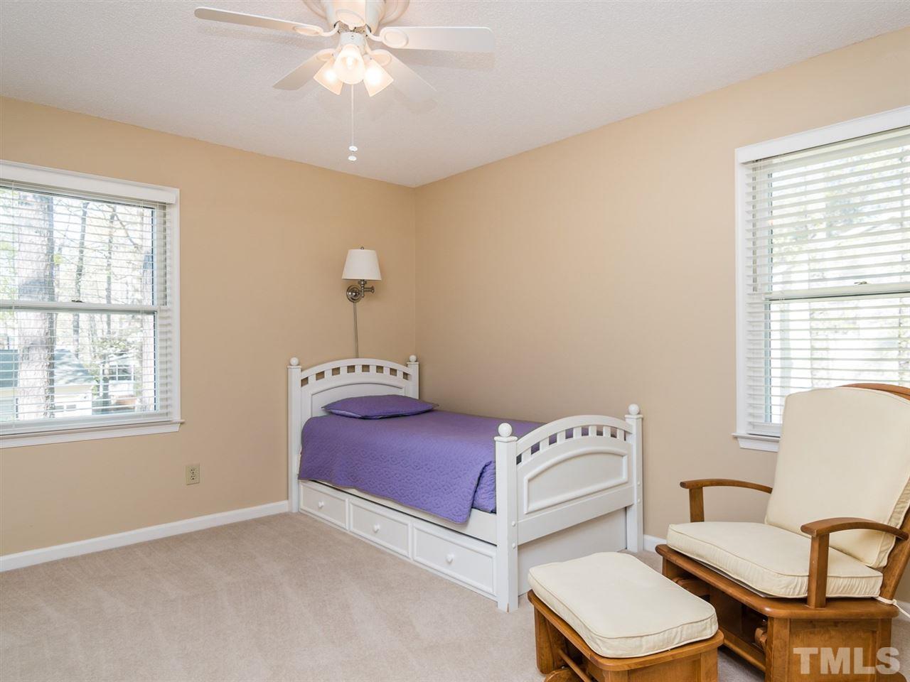 112 Trackers Road Cary, NC 27513 - Photo 19 of 25 All bedrooms have carpeting and ceiling fans.