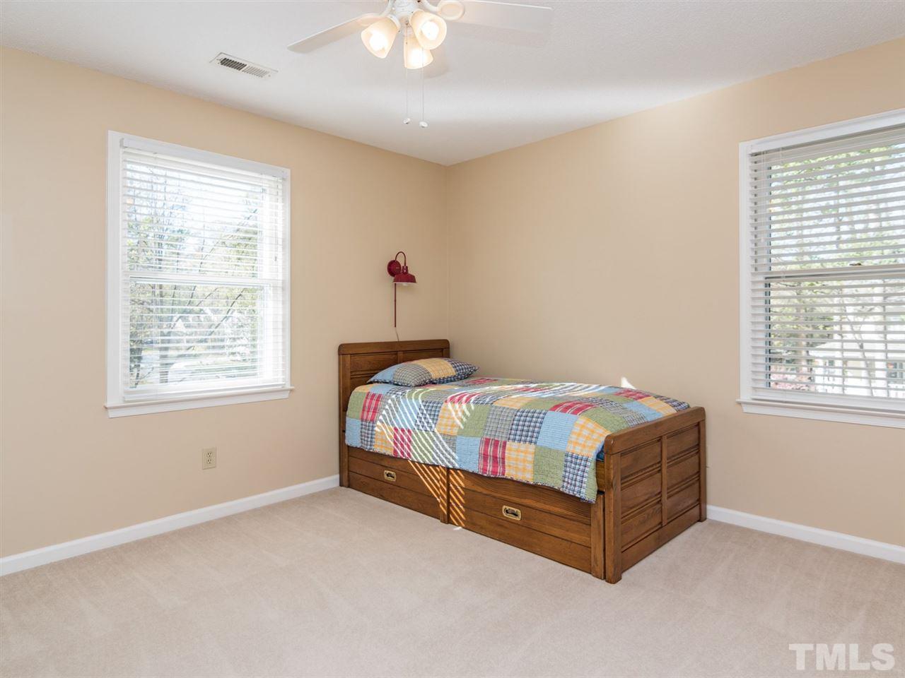 112 Trackers Road Cary, NC 27513 - Photo 20 of 25 Ceiling fans are found in all bedrooms as well.