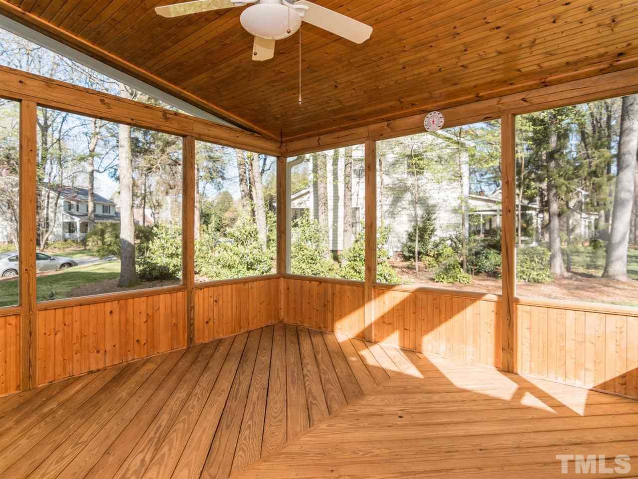 112 Trackers Road Cary, NC 27513 - Photo 21 of 25 The screen porch can be used many months of the year with the great weather we have in North Carolina. Enjoying relaxing here while watching the kids play in the back yard.