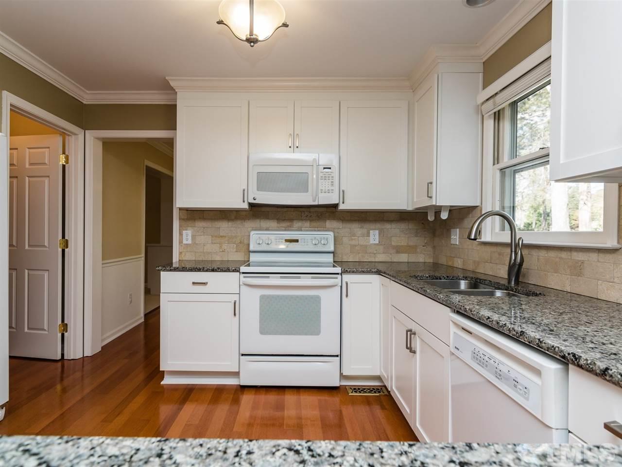 112 Trackers Road Cary, NC 27513 - Photo 7 of 25 The cabinets have soft-close drawers and there is a Lazy Susan.