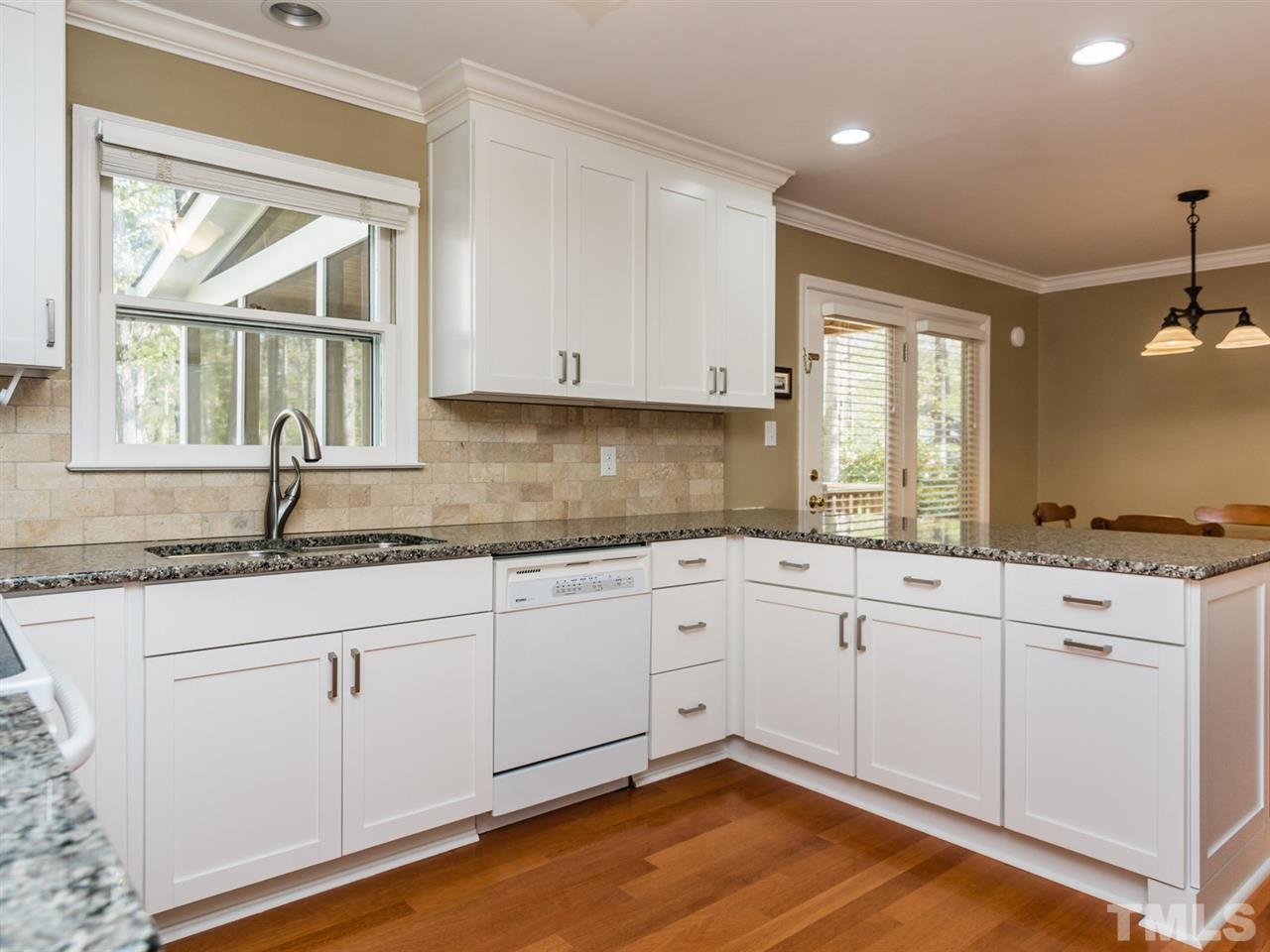 112 Trackers Road Cary, NC 27513 - Photo 9 of 25 All kitchen appliances convey with the sale of this home which include the refrigerator.