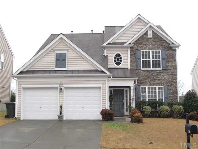 5443 Shaker Heights Lane Raleigh, NC 27613 - Photo 1 of 14 a front view of a house with a yard