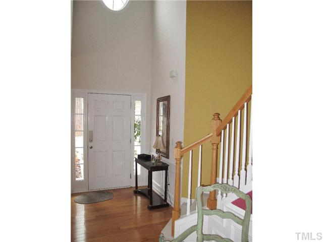 5443 Shaker Heights Lane Raleigh, NC 27613 - Photo 2 of 14 a view of a livingroom with furniture and stairs