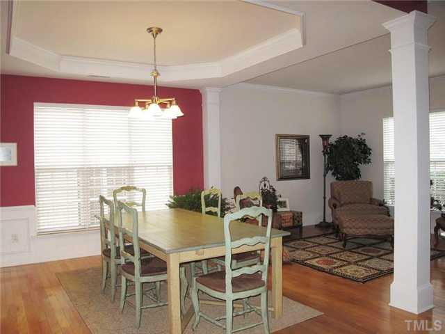 5443 Shaker Heights Lane Raleigh, NC 27613 - Photo 4 of 14 a view of a dining room with furniture and window