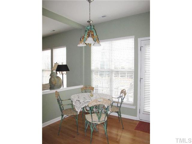 5443 Shaker Heights Lane Raleigh, NC 27613 - Photo 7 of 14 a dining room with furniture and window