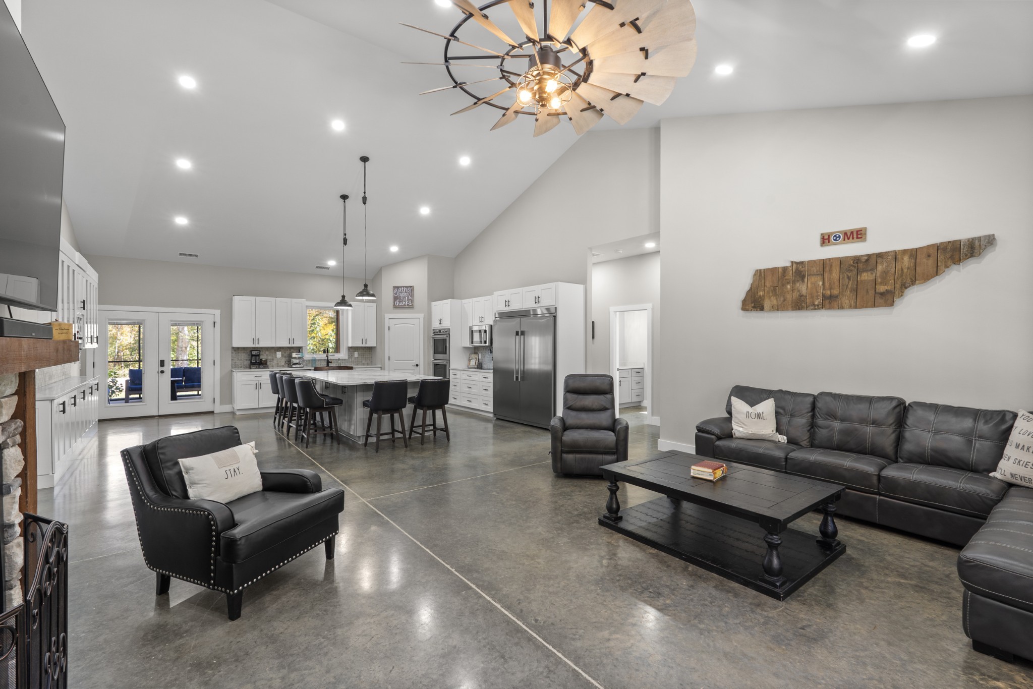 594 Highway 100 Centerville, TN 37033 - Photo 13 of 40 a living room with furniture kitchen view and a chandelier