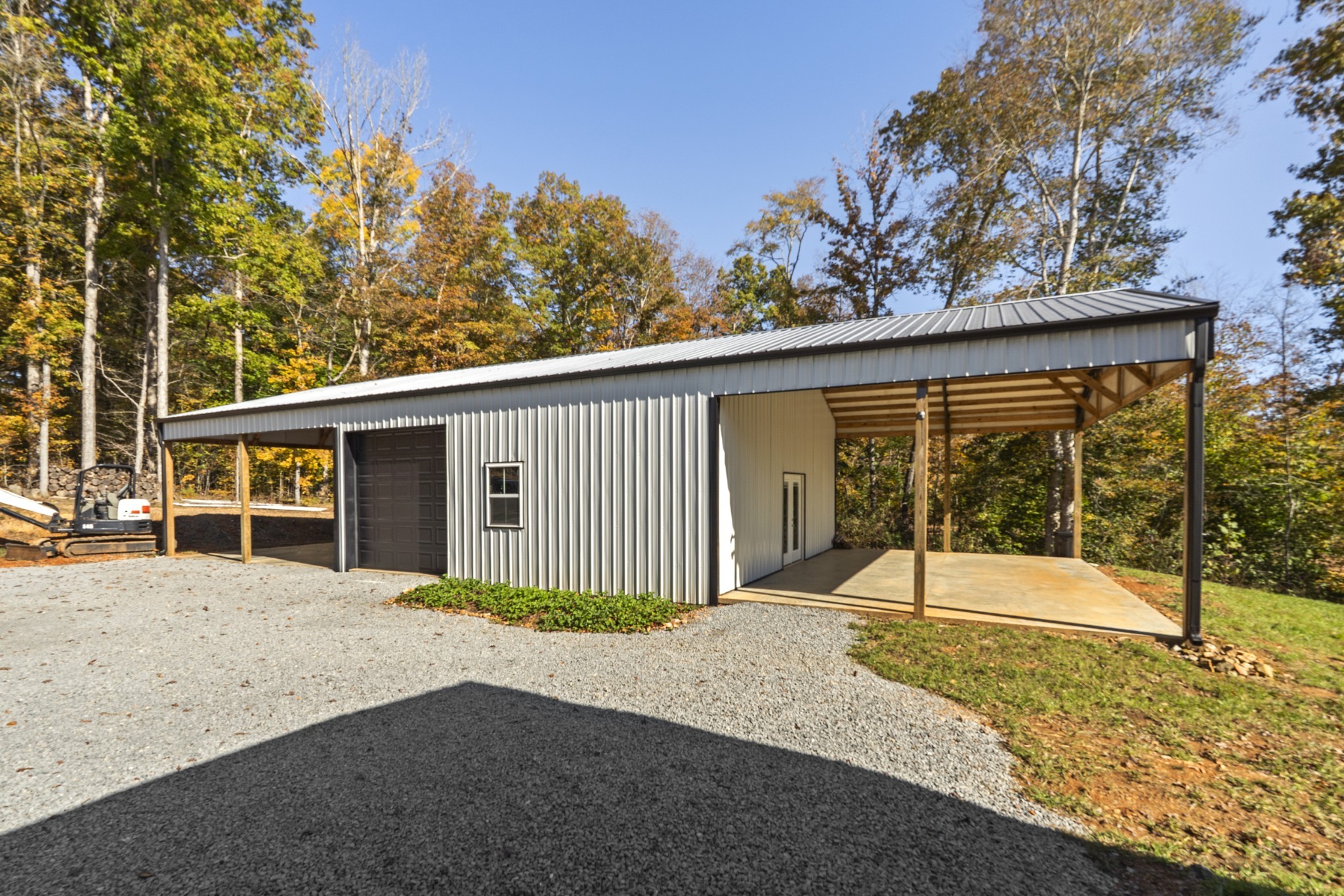 594 Highway 100 Centerville, TN 37033 - Photo 30 of 40 a house with trees in the background