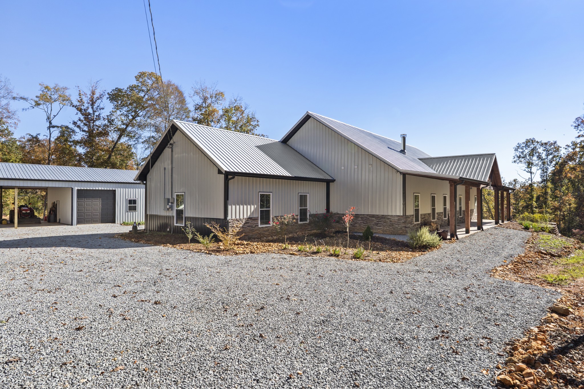 594 Highway 100 Centerville, TN 37033 - Photo 3 of 40 a view of a house with backyard