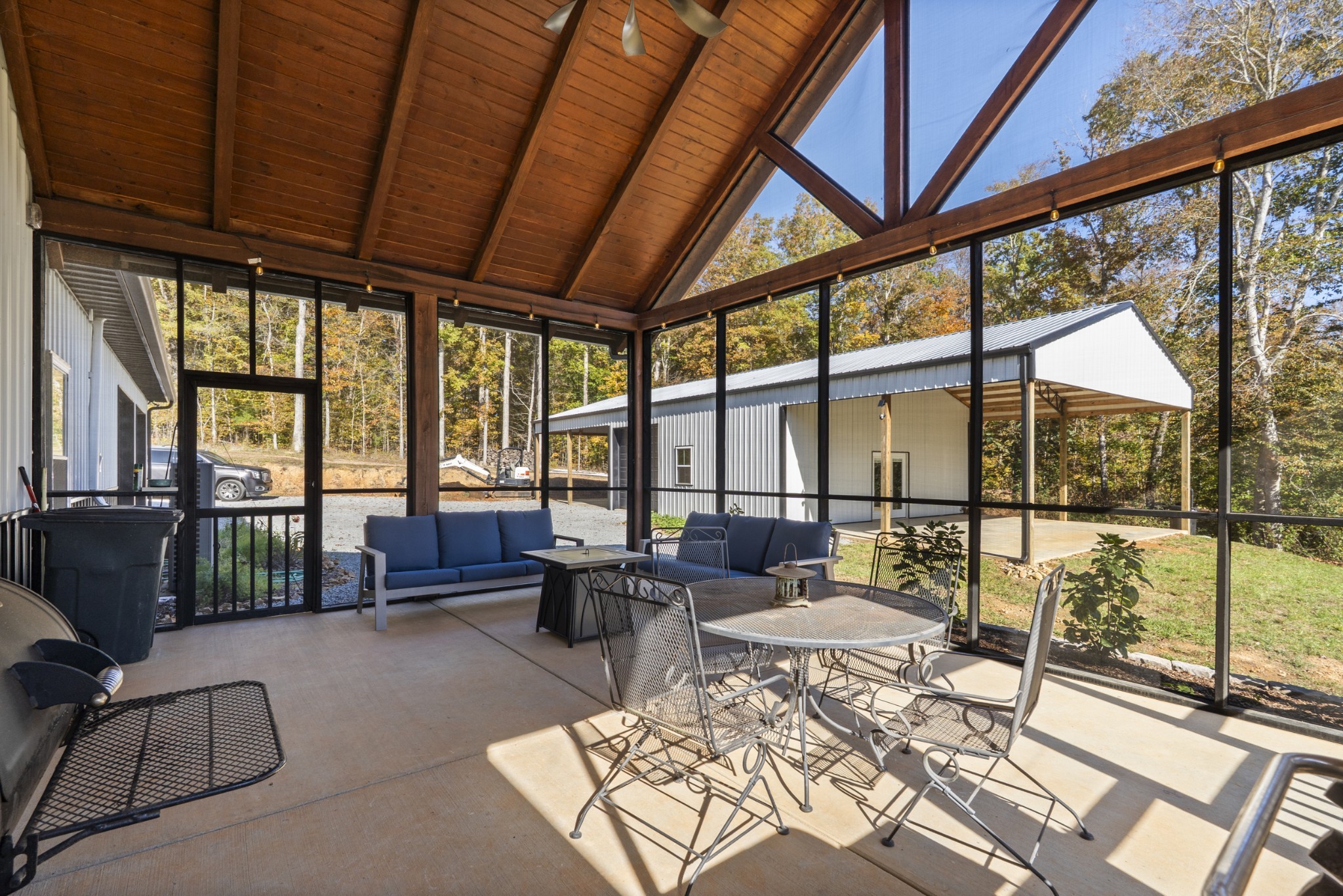 594 Highway 100 Centerville, TN 37033 - Photo 32 of 40 a living room with furniture and a floor to ceiling window