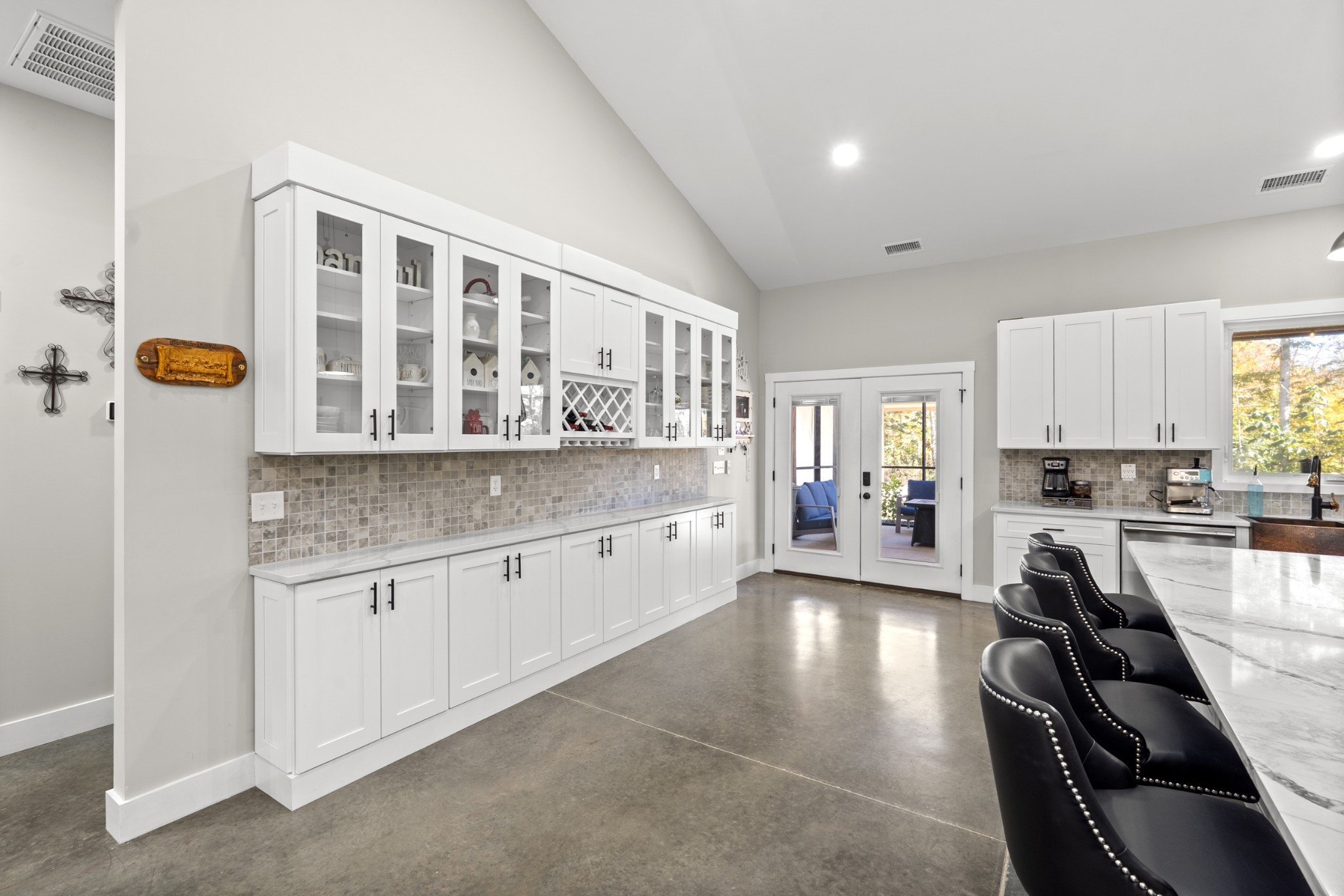 594 Highway 100 Centerville, TN 37033 - Photo 6 of 40 a large white kitchen with granite countertop a stove and a sink