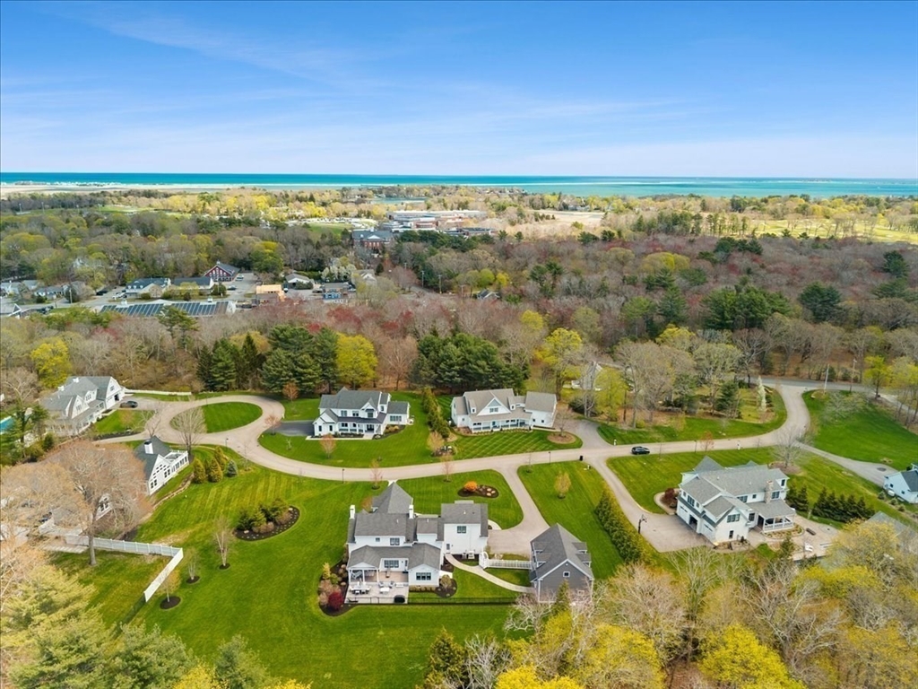 6 Cooper Hill Road Duxbury, MA 02332 - Photo 40 of 42 a view of a swimming pool with a lake view