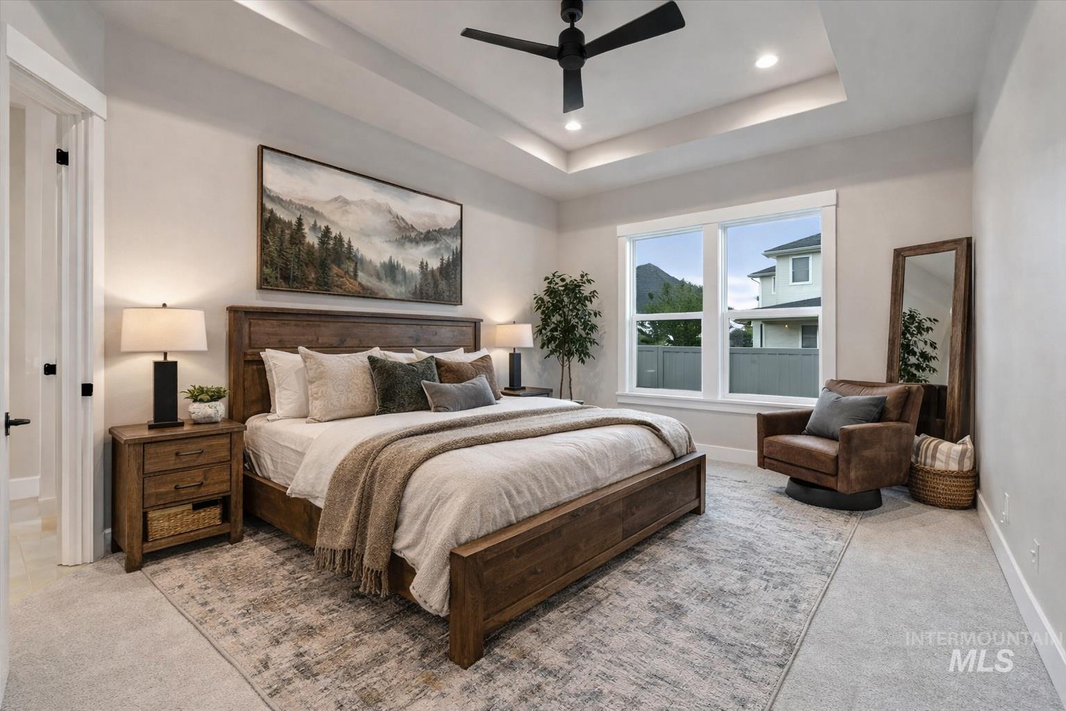 2147 East Blakehurst Avenue Kuna, ID 83634 - Photo 19 of 43 Bedroom featuring light carpet, a ceiling fan, recessed lighting, and a raised ceiling