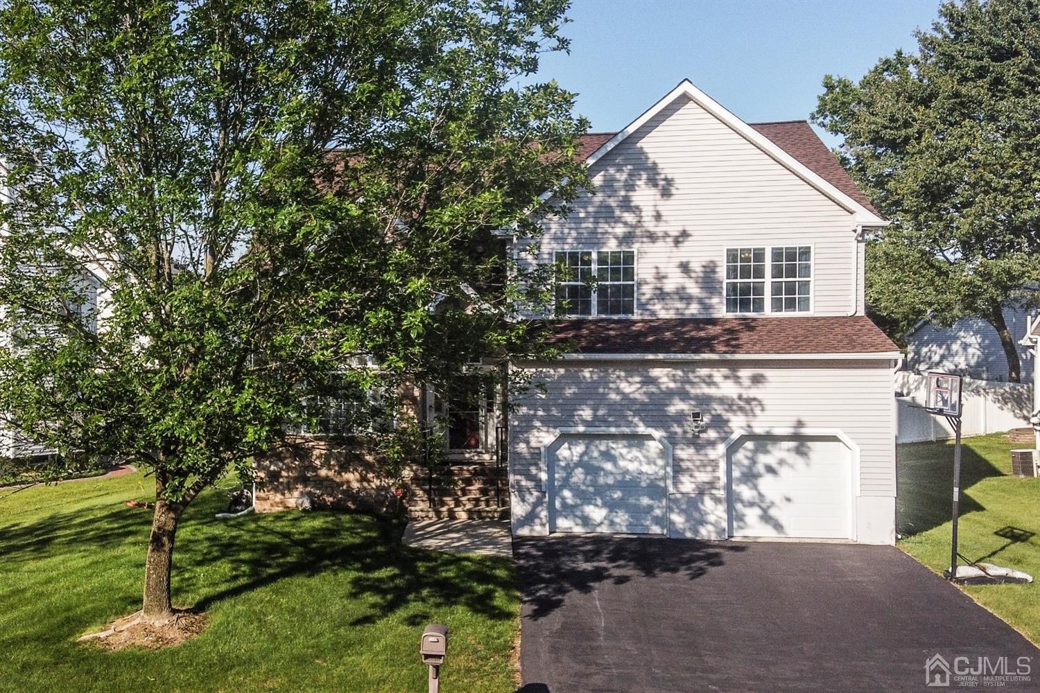14 Pointer Place Kendall Park, NJ 08824 - Photo 2 of 34 a view of a house with a yard