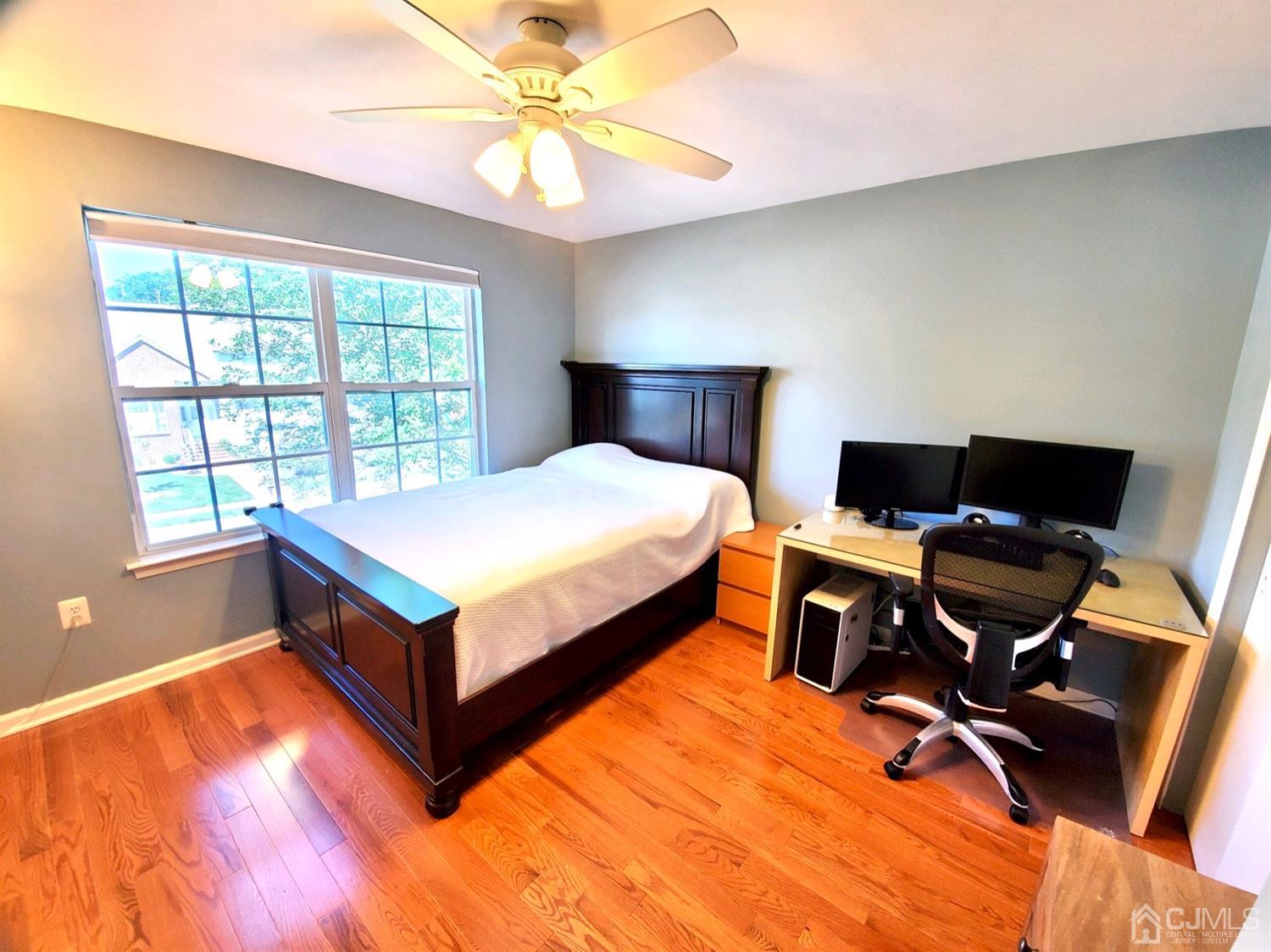 14 Pointer Place Kendall Park, NJ 08824 - Photo 23 of 34 a bedroom with a bed and a window