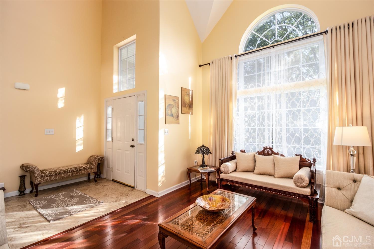 14 Pointer Place Kendall Park, NJ 08824 - Photo 4 of 34 a living room with furniture and a window