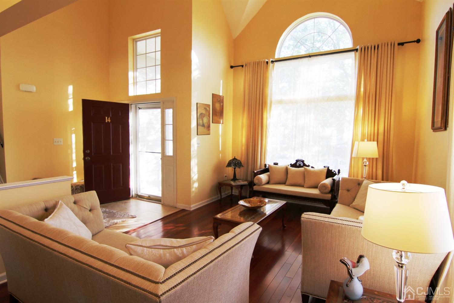 14 Pointer Place Kendall Park, NJ 08824 - Photo 5 of 34 a living room with furniture and a large window