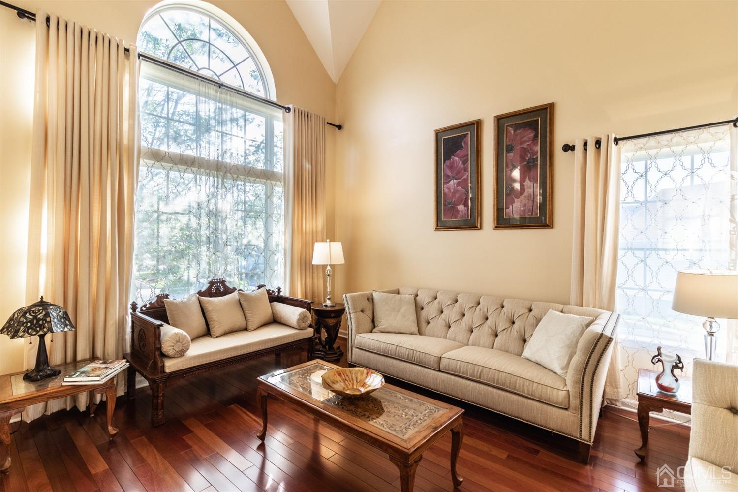 14 Pointer Place Kendall Park, NJ 08824 - Photo 6 of 34 a living room with furniture and a large window