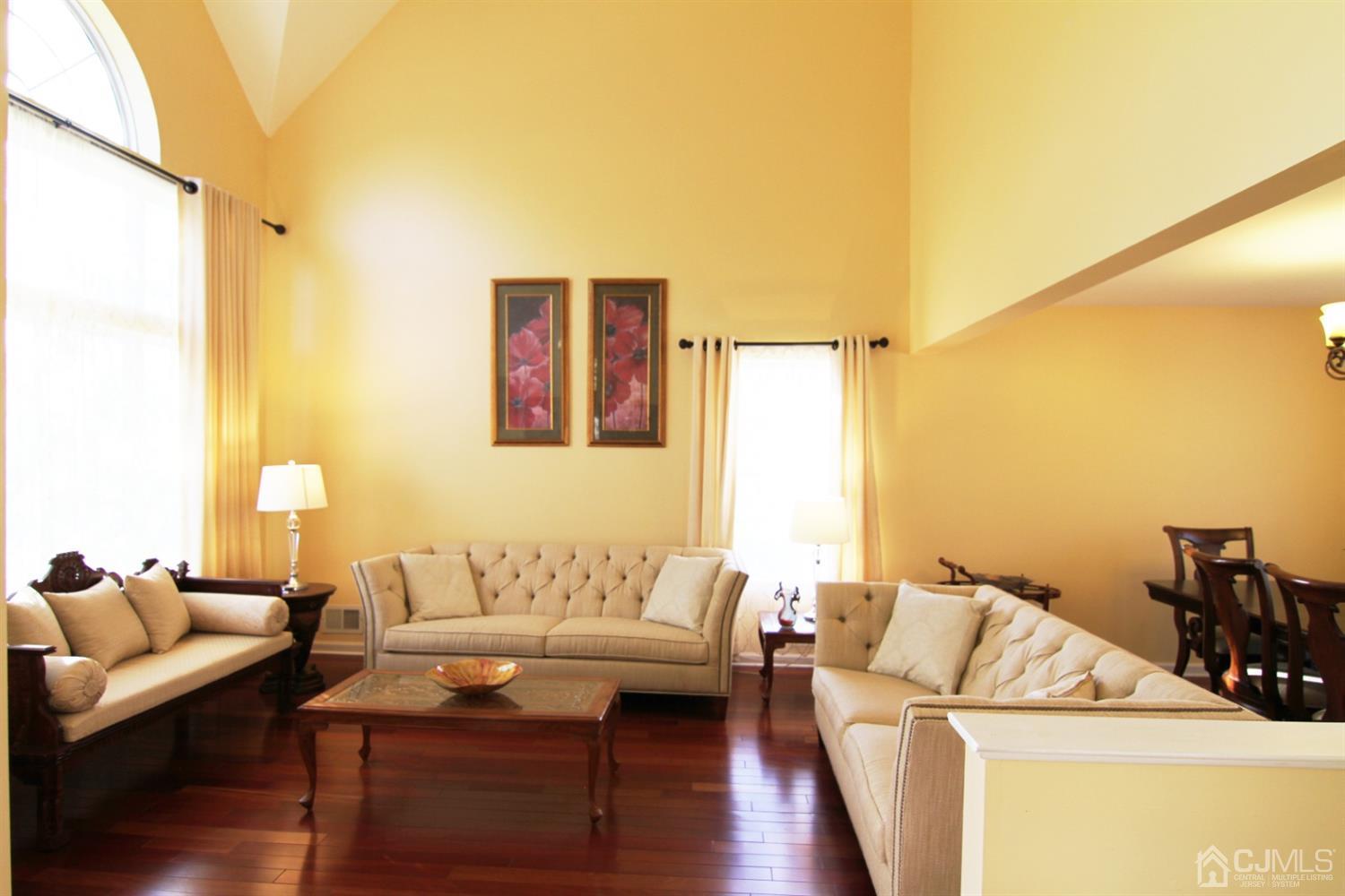 14 Pointer Place Kendall Park, NJ 08824 - Photo 8 of 34 a living room with furniture and a table