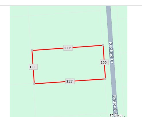 Tbd Redbud Drive Conroe, TX 77302 - Photo 2 of 3 a close up of a wall with a window