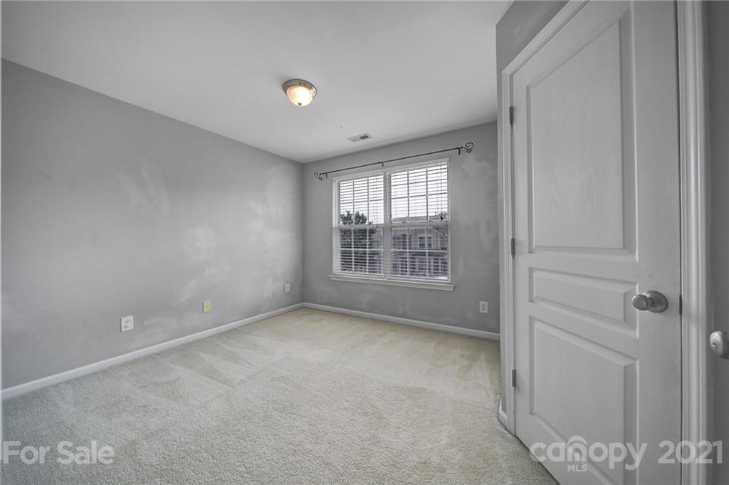 971 Copperstone Lane Fort Mill, SC 29708 - Photo 15 of 26 a view of an empty room with a window