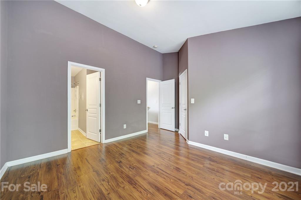 971 Copperstone Lane Fort Mill, SC 29708 - Photo 18 of 26 a view of an empty room with wooden floor