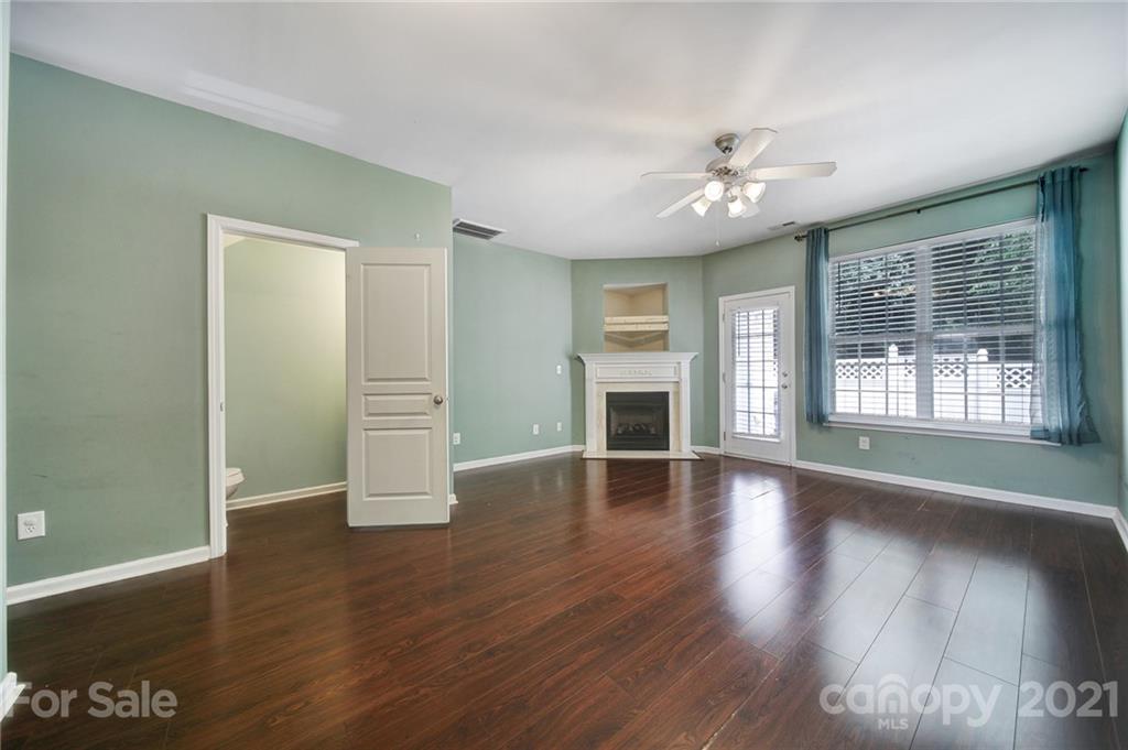 971 Copperstone Lane Fort Mill, SC 29708 - Photo 7 of 26 wooden floor in an empty room with a window