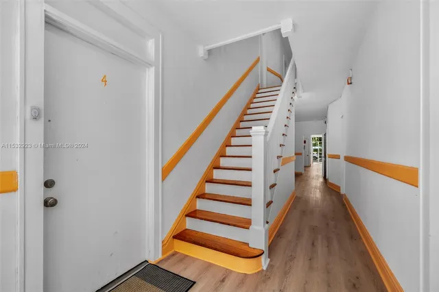a bathroom with a toilet a sink and bathtub