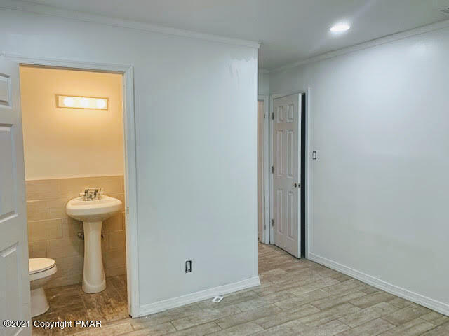 285 Powder Horn Road Henryville, PA 18332 - Photo 13 of 24 a view of a bathroom with a sink and a toilet