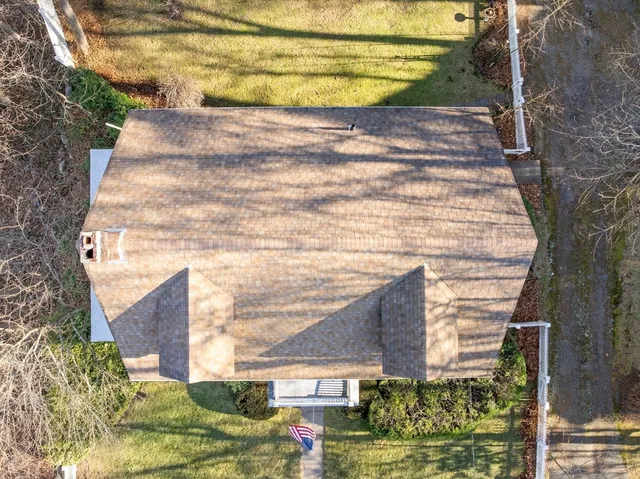 a view of a back yard of the house