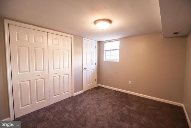 3323 Southgreen Road Baltimore, MD 21244 - Photo 19 of 25 an empty room with windows