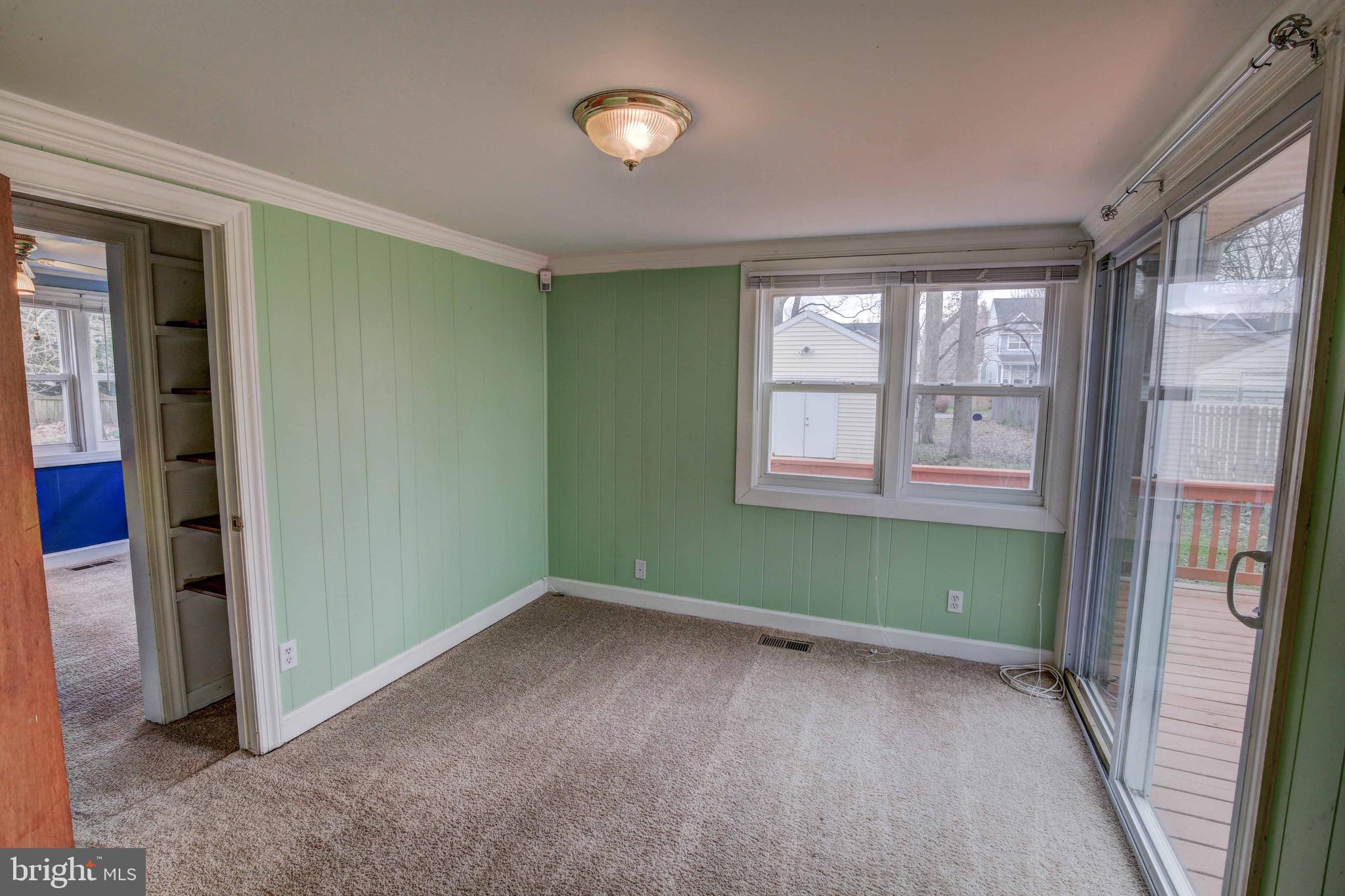 1263 Steamboat Road Shady Side, MD 20764 - Photo 13 of 25 Den/office with access to the deck