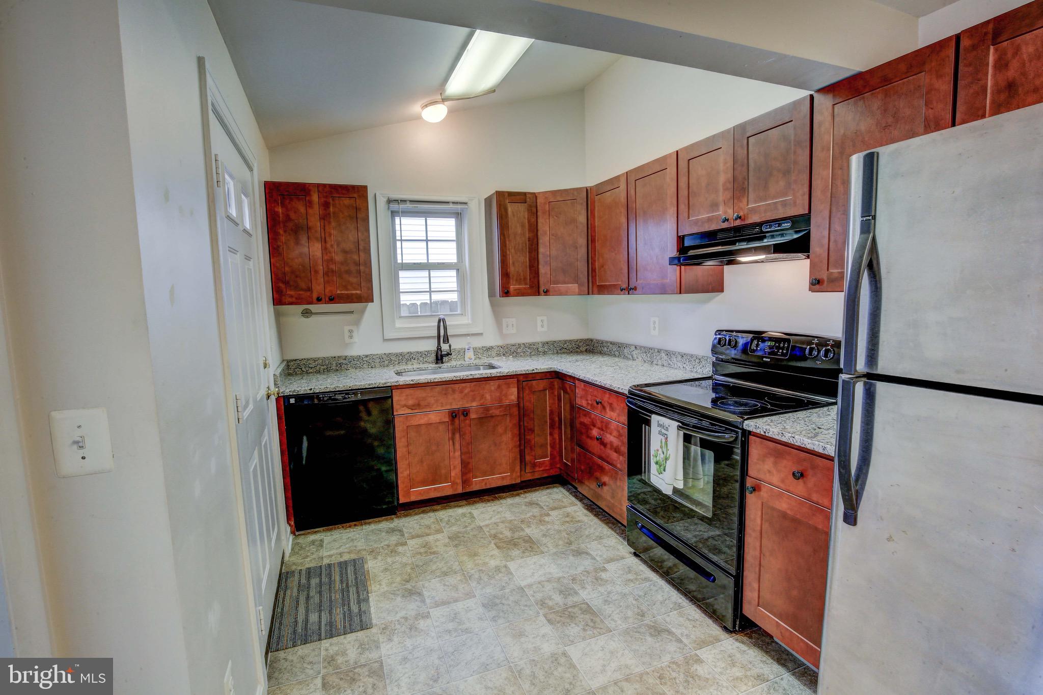 1263 Steamboat Road Shady Side, MD 20764 - Photo 16 of 25 Kitchen with vaulted ceiling