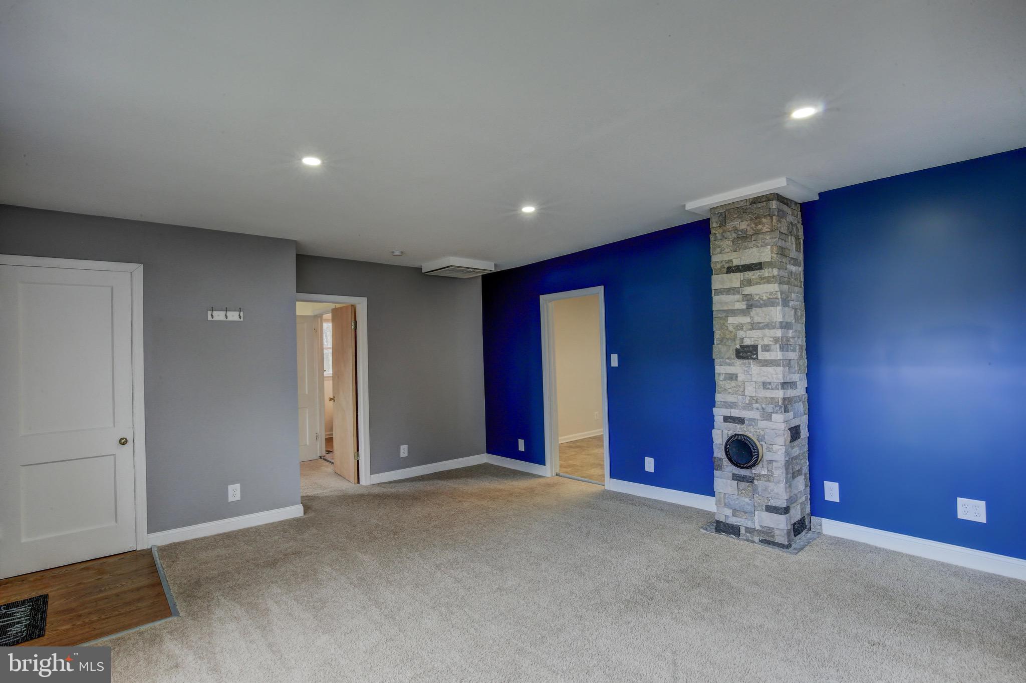 1263 Steamboat Road Shady Side, MD 20764 - Photo 10 of 25 New recessed lighting and stacked stone feature