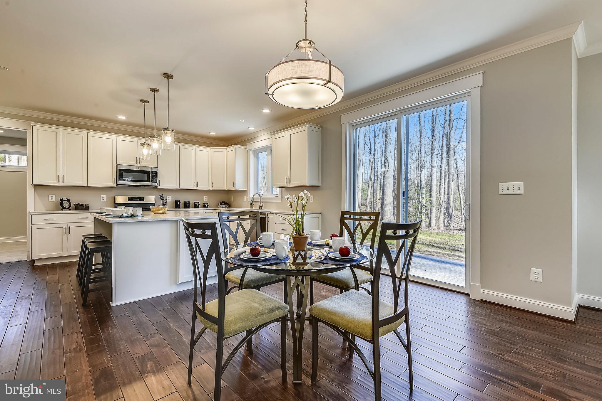 502 Teak Road Crownsville, MD 21032 - Photo 9 of 30 Kitchen with Island and Kitchen Table Space