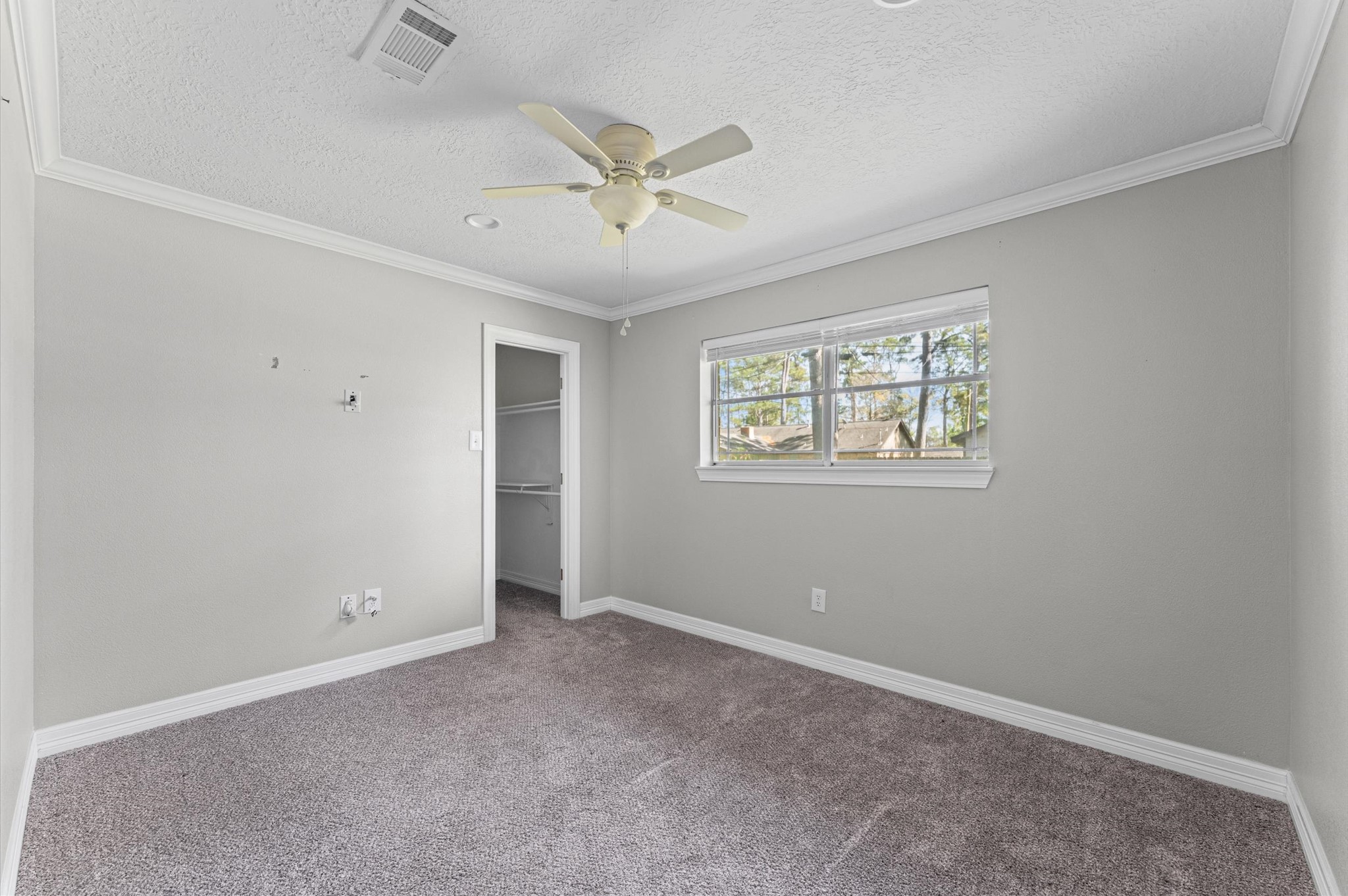 2702 Crowell Lane Baytown, TX 77521 - Photo 16 of 26 a view of an empty room with a window