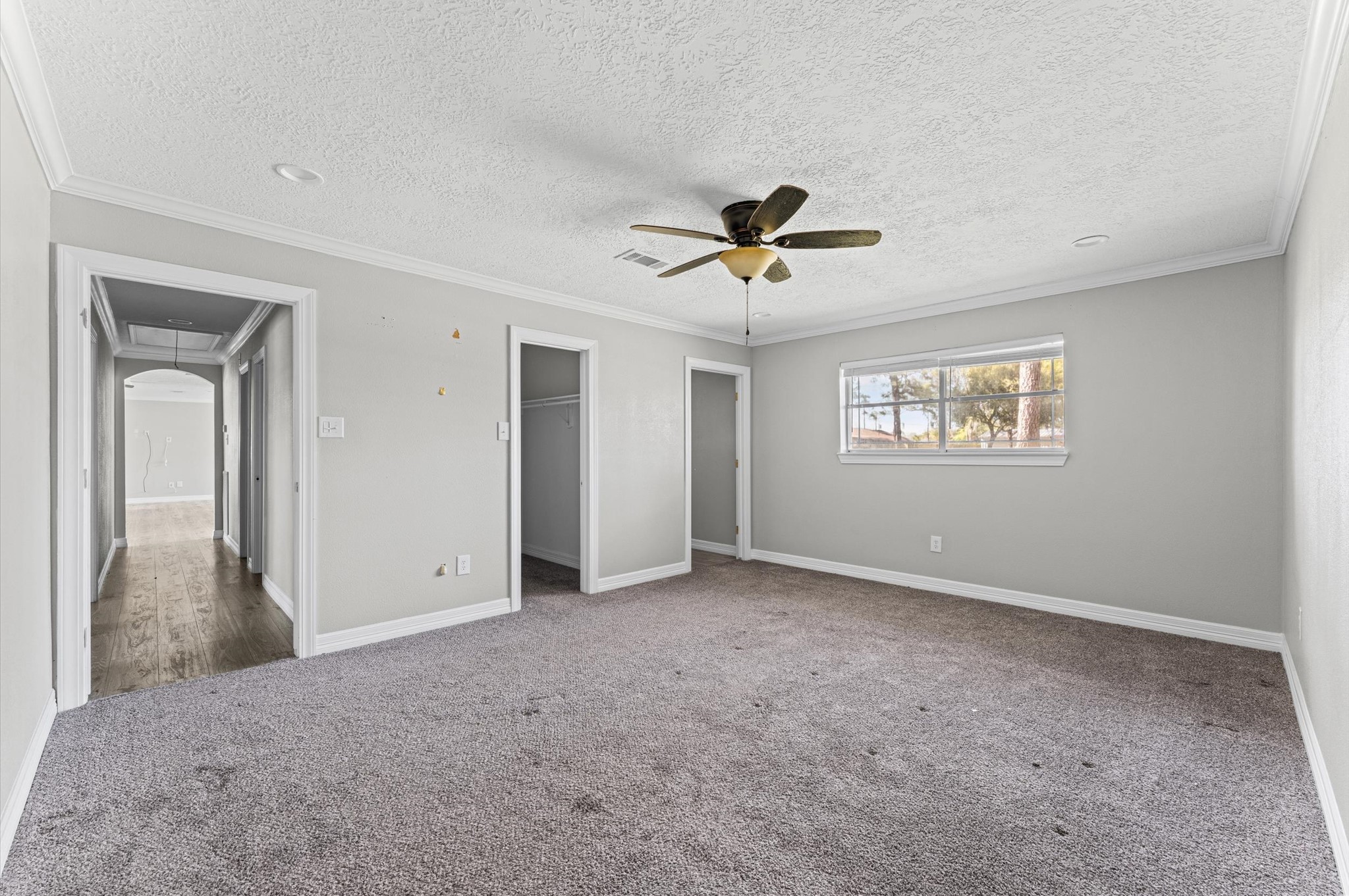 2702 Crowell Lane Baytown, TX 77521 - Photo 18 of 26 a view of an empty room with a window