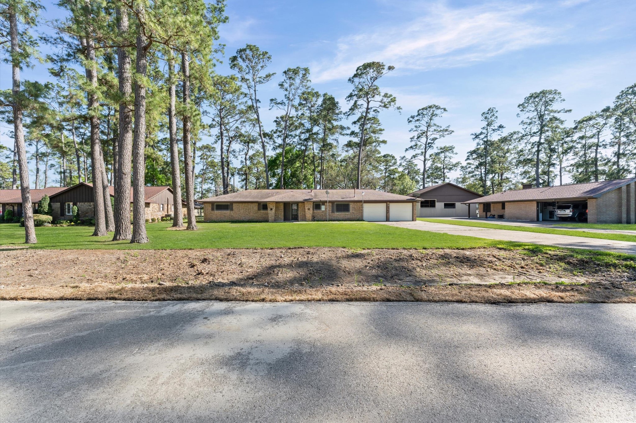 2702 Crowell Lane Baytown, TX 77521 - Photo 26 of 26 a view of a house with a yard
