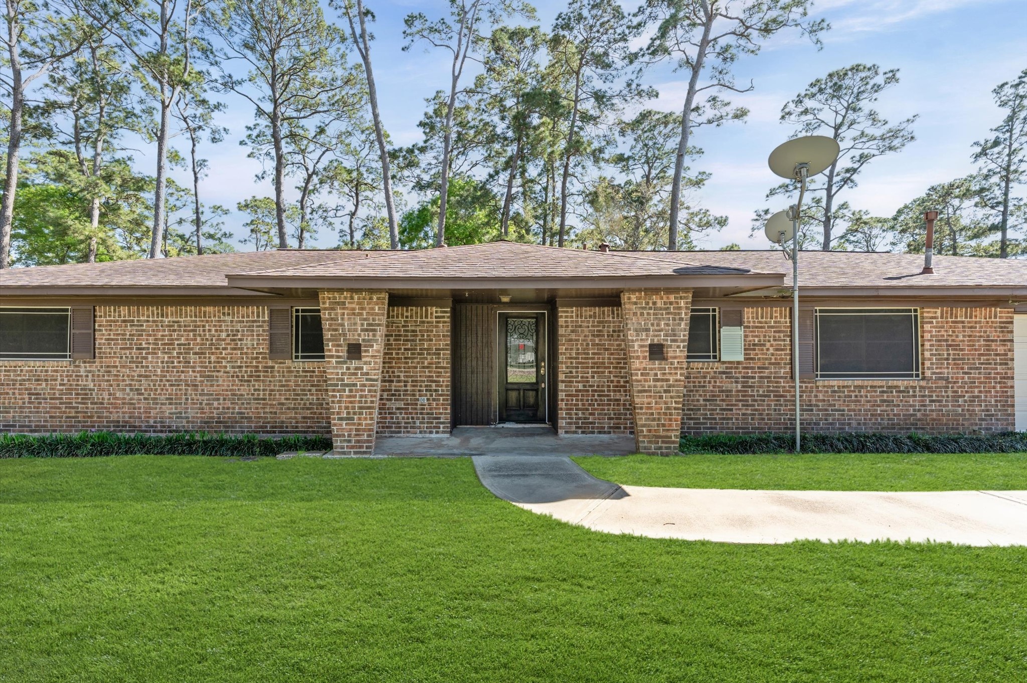 2702 Crowell Lane Baytown, TX 77521 - Photo 4 of 26 a view of a house with a yard
